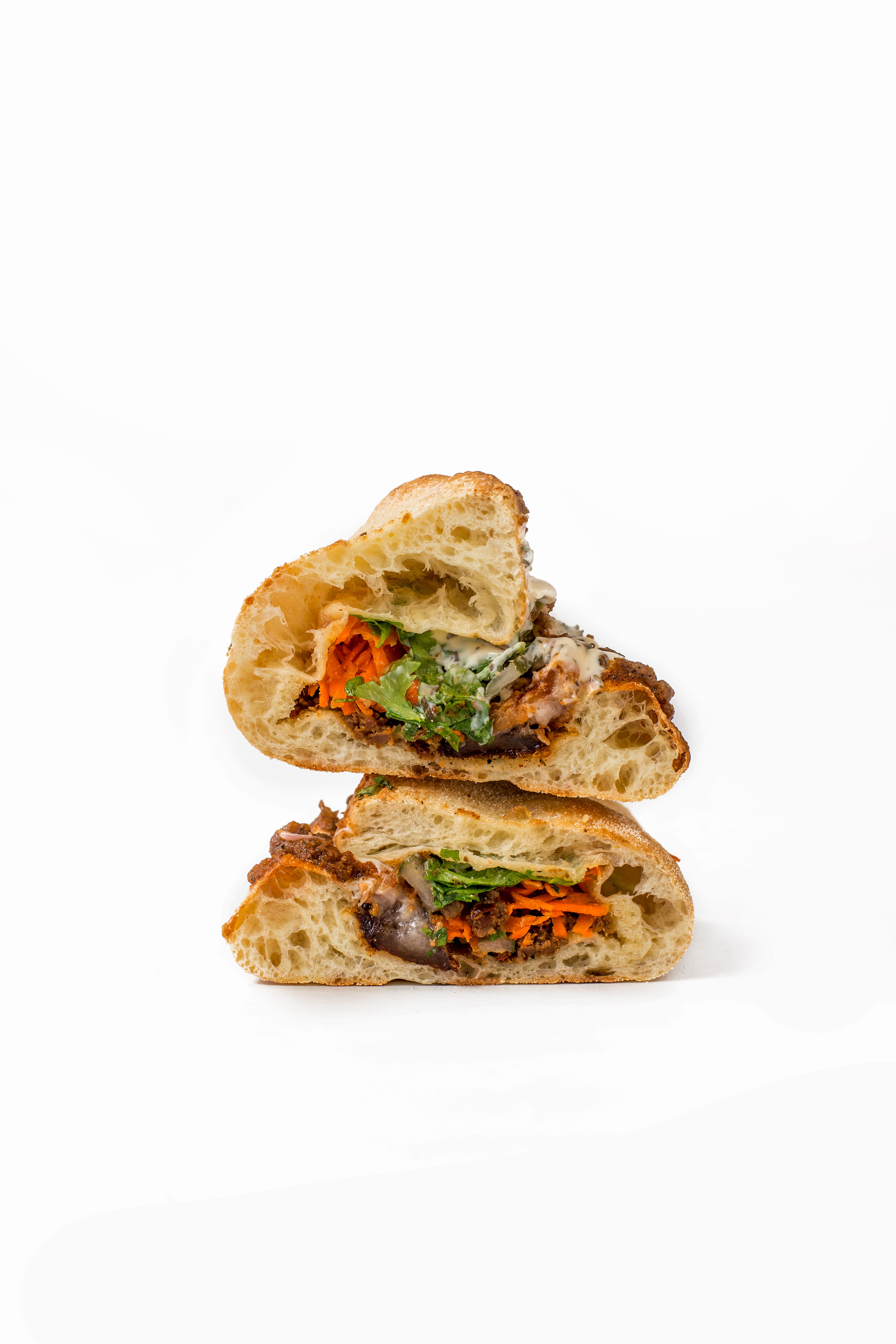 Crispy Sichuan Pork B&aacute;nh Mi 🌶️🐖 &mdash; Flat Coast Sanur Bali &mdash; inside view